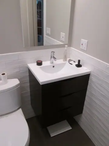 A simple, elegant bathroom featuring a floating vanity in Noe Valley, San Francisco, photo 9