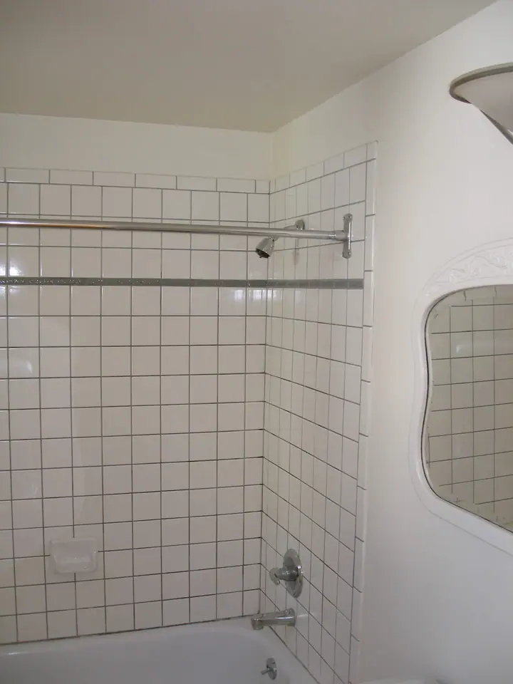 Stylish bath remodel with a floating vanity in the Inner Richmond, San Francisco: old valve wall