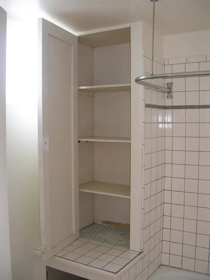 Stylish bath remodel with a floating vanity in the Inner Richmond, San Francisco: open cab old