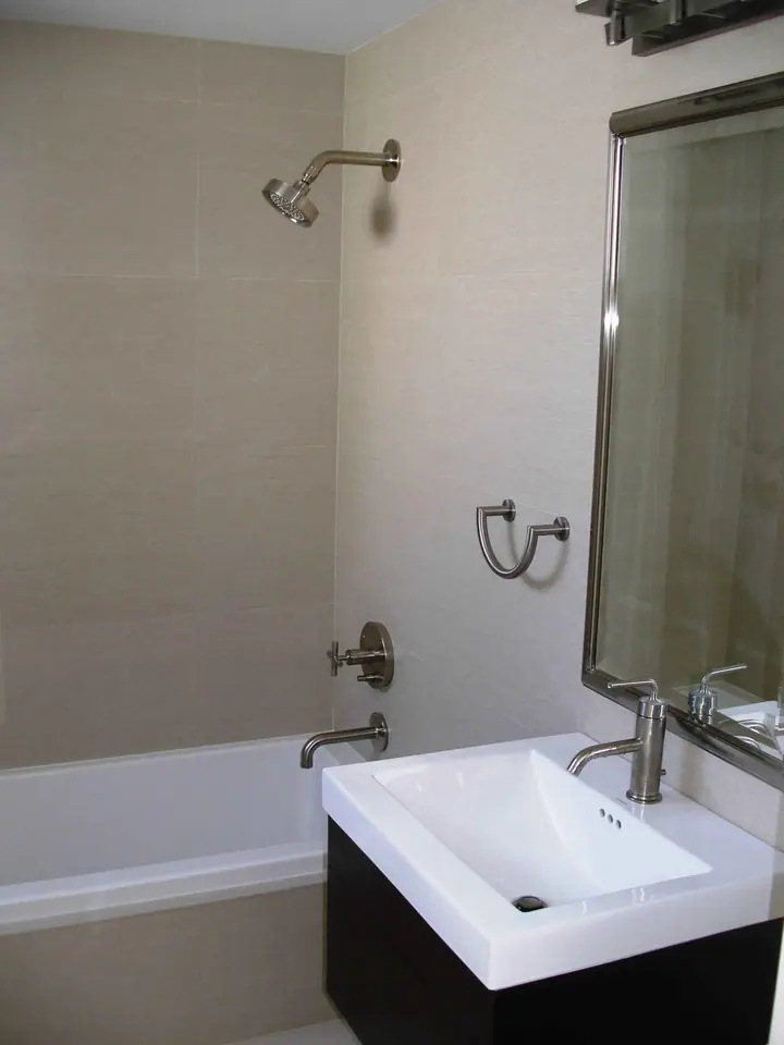 Stylish bath remodel with a floating vanity in the Inner Richmond, San Francisco: van to tub