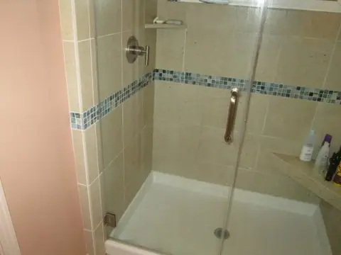 Bath remodel with a custom medicine cabinet: shower valve end