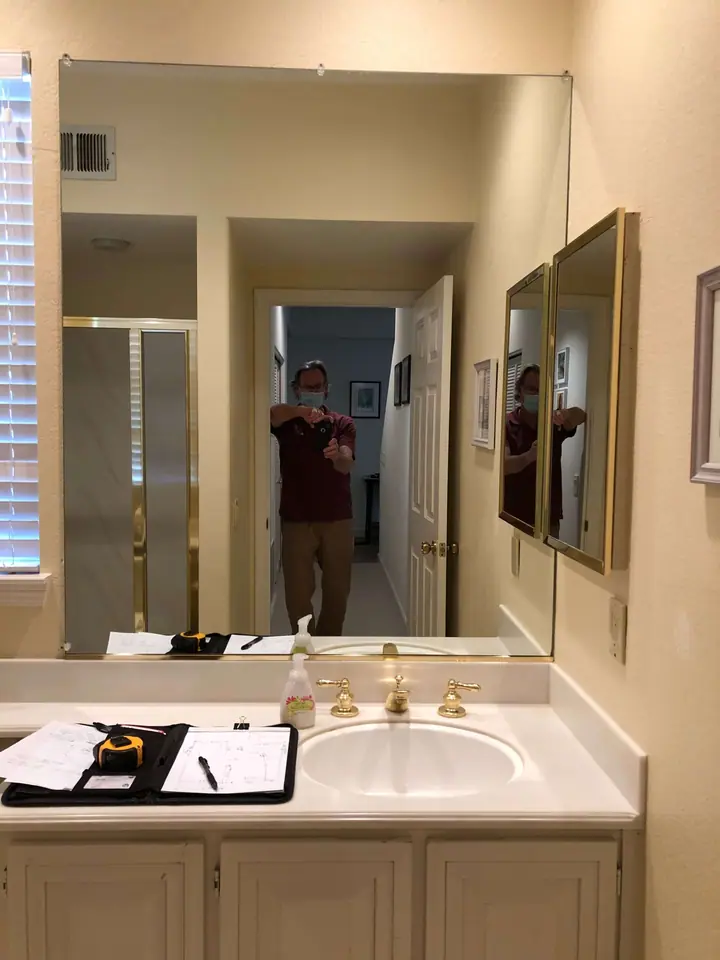 Guest bath remodel in San Rafael: Before Big ugly mirror