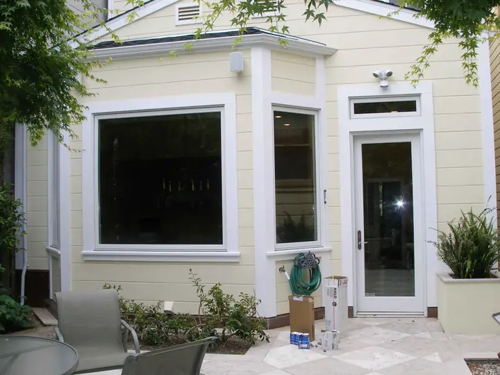 Outside of a new dining bay addition with large windows