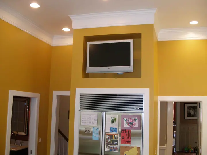 Kitchen and dining bay addition with new island, crown and TV alcove: flat screen alcove