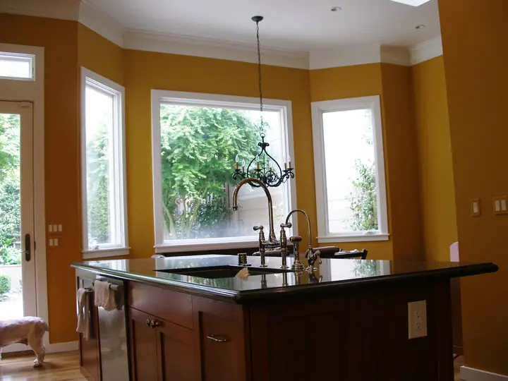 Kitchen and dining bay addition with a new island
