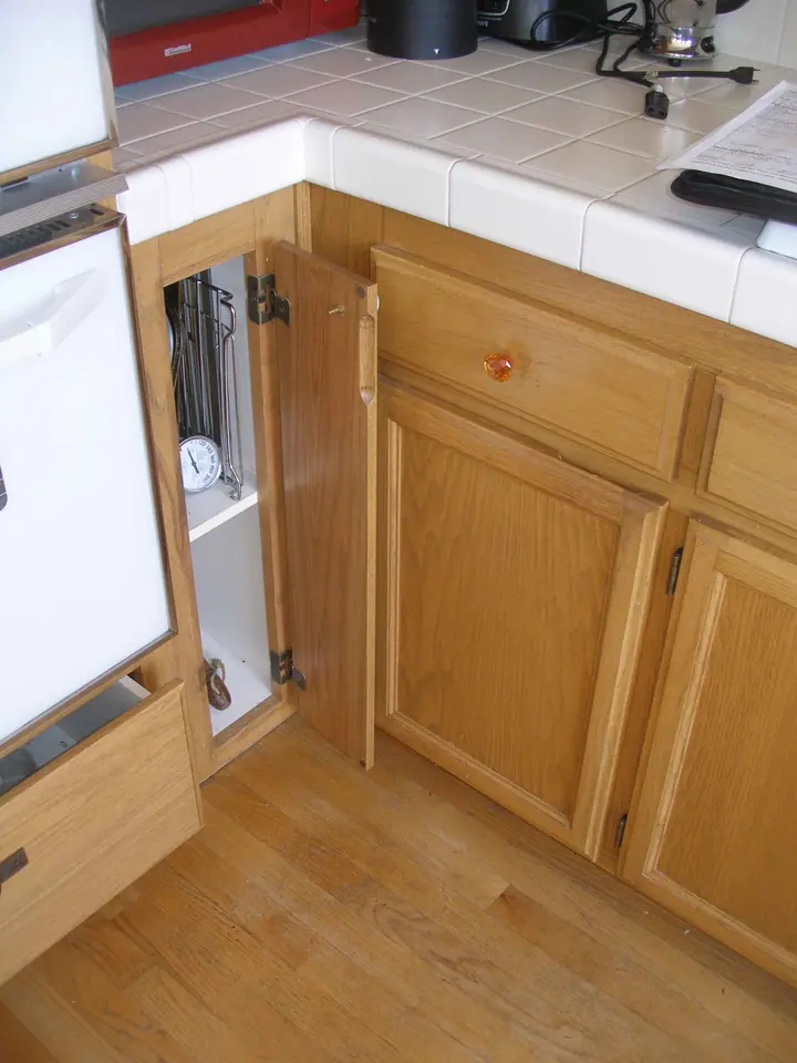 Kitchen reorientation remodel with special features in Petaluma: Before corner cab location
