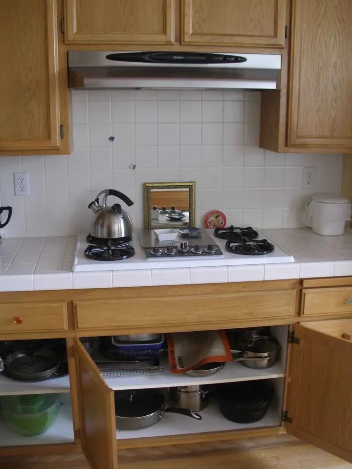 Kitchen reorientation remodel with special features in Petaluma: Before range alcove