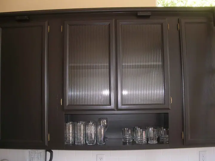 Kitchen reorientation remodel with special features in Petaluma: glass doors