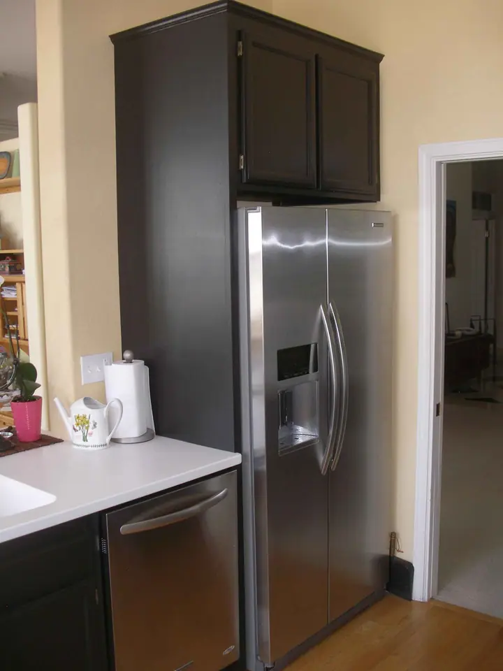 Kitchen reorientation remodel with special features in Petaluma: old pantry location now fridge