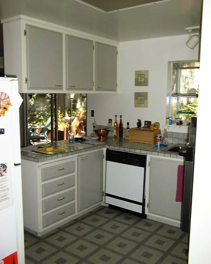 Major kitchen alteration in Novato: Before toward back door and wall