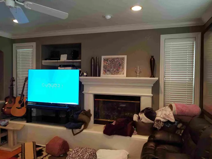 Novato fireplace remodel: Before the fireplace wall and elongated hearth
