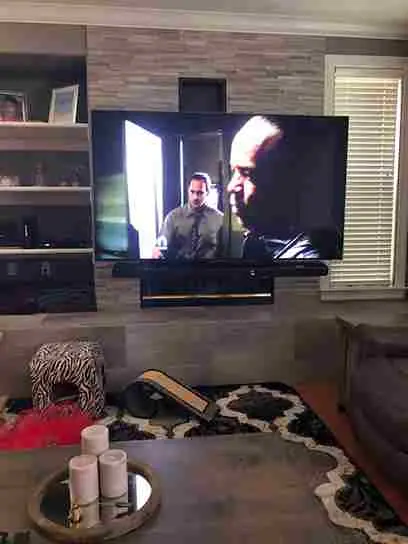 Novato fireplace remodel: tv down for better viewing.