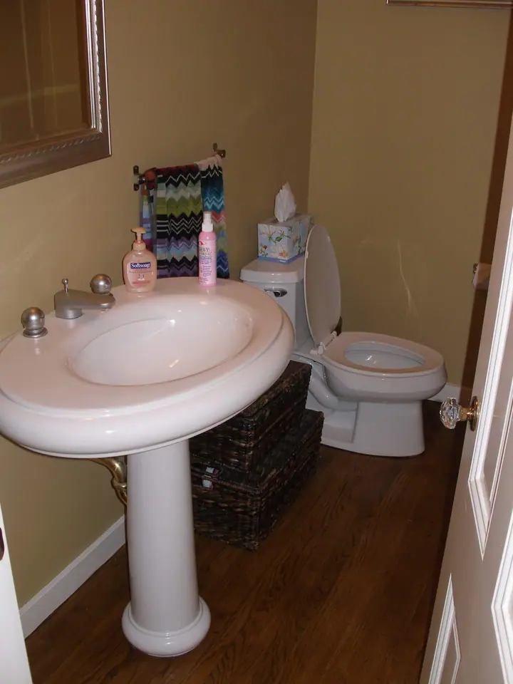 Pacific Heights guest bath with a freestanding vanity and new tile floor: bath before
