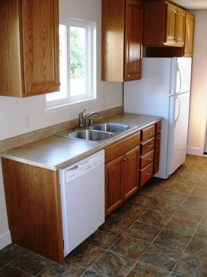 Rental kitchen that was in bad shape, Novato: sink wall