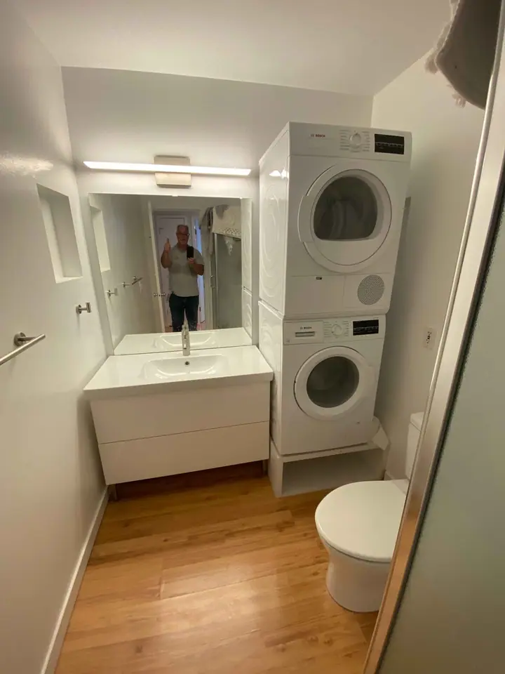 Retrofitting a washer and dryer into a bathroom in Mill Valley: finished wide shot