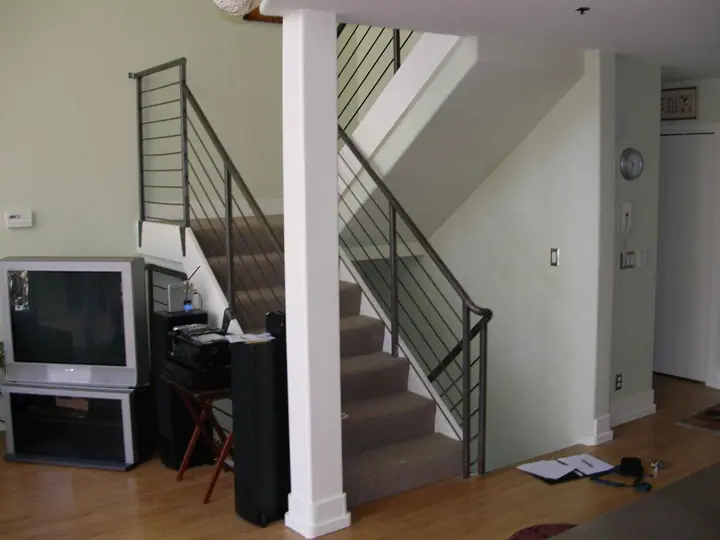 Retrofit wall to isolate an open stairway for privacy, Mission District, San Francisco: Before wide shot
