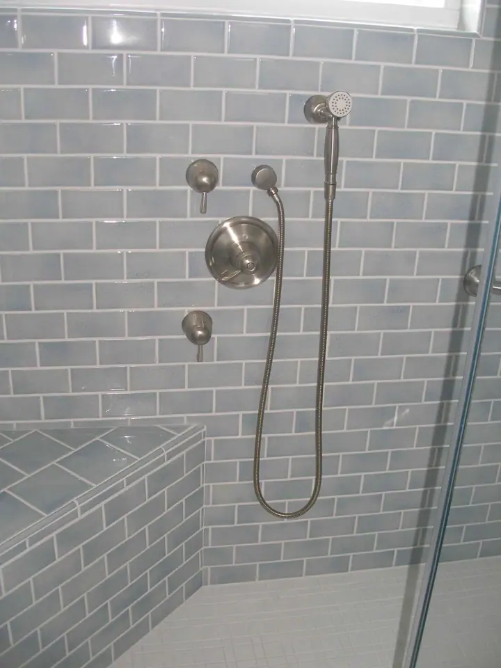 Shower remodel in Terra Linda, San Rafael: handy valve location with the hand held reachable from the bench