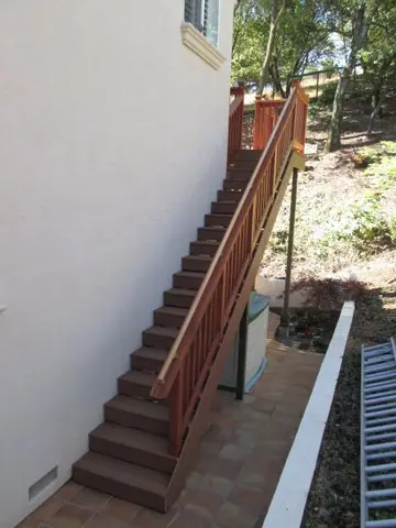 Simple redwood deck in Corte Madera: side stairs